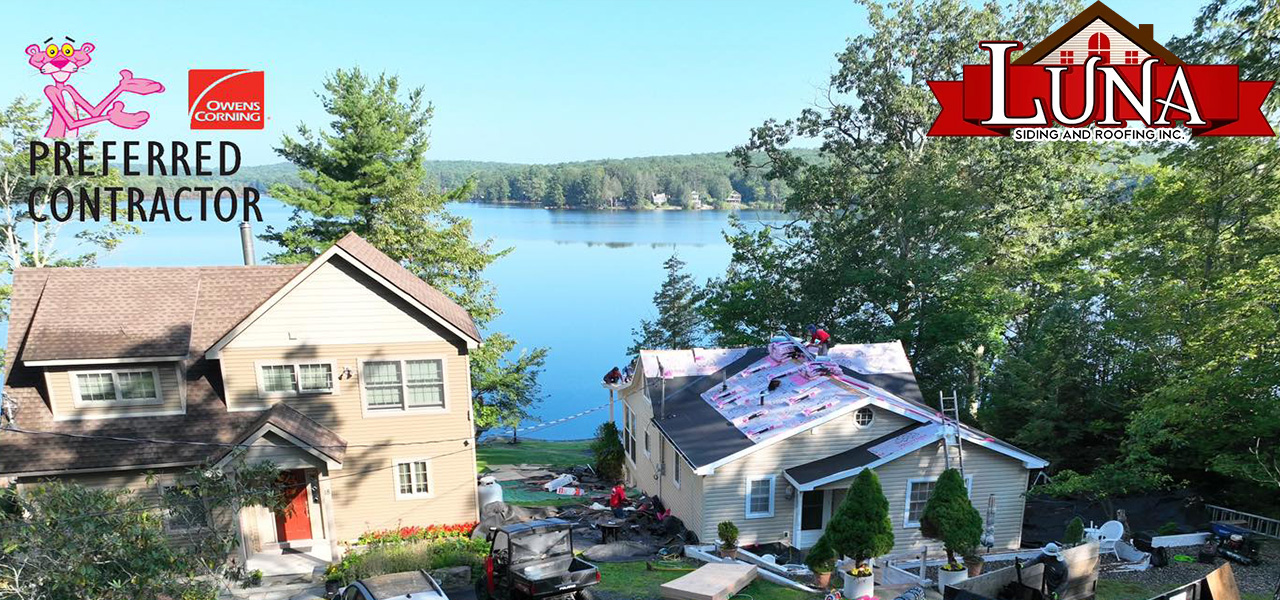 Roofing company in Highland, NY inspecting shingles and flashing
