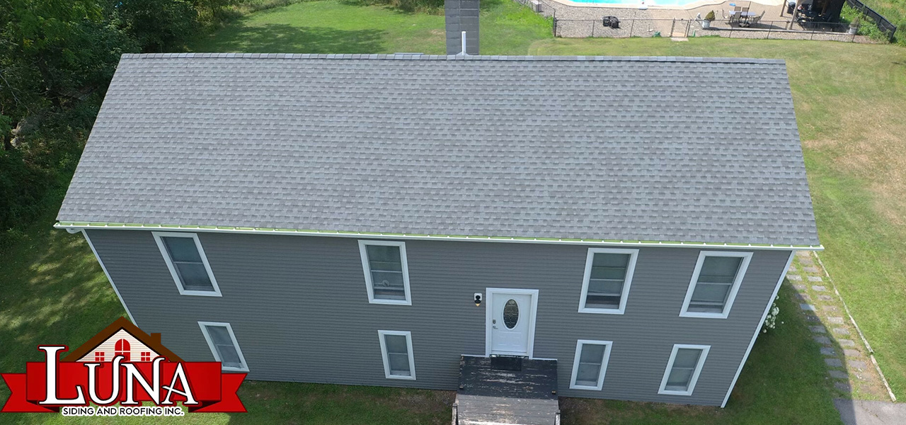 Roofing company in New Paltz, NY performing a roof inspection